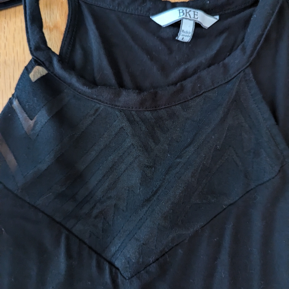 Bke tank with sheer detail on chest